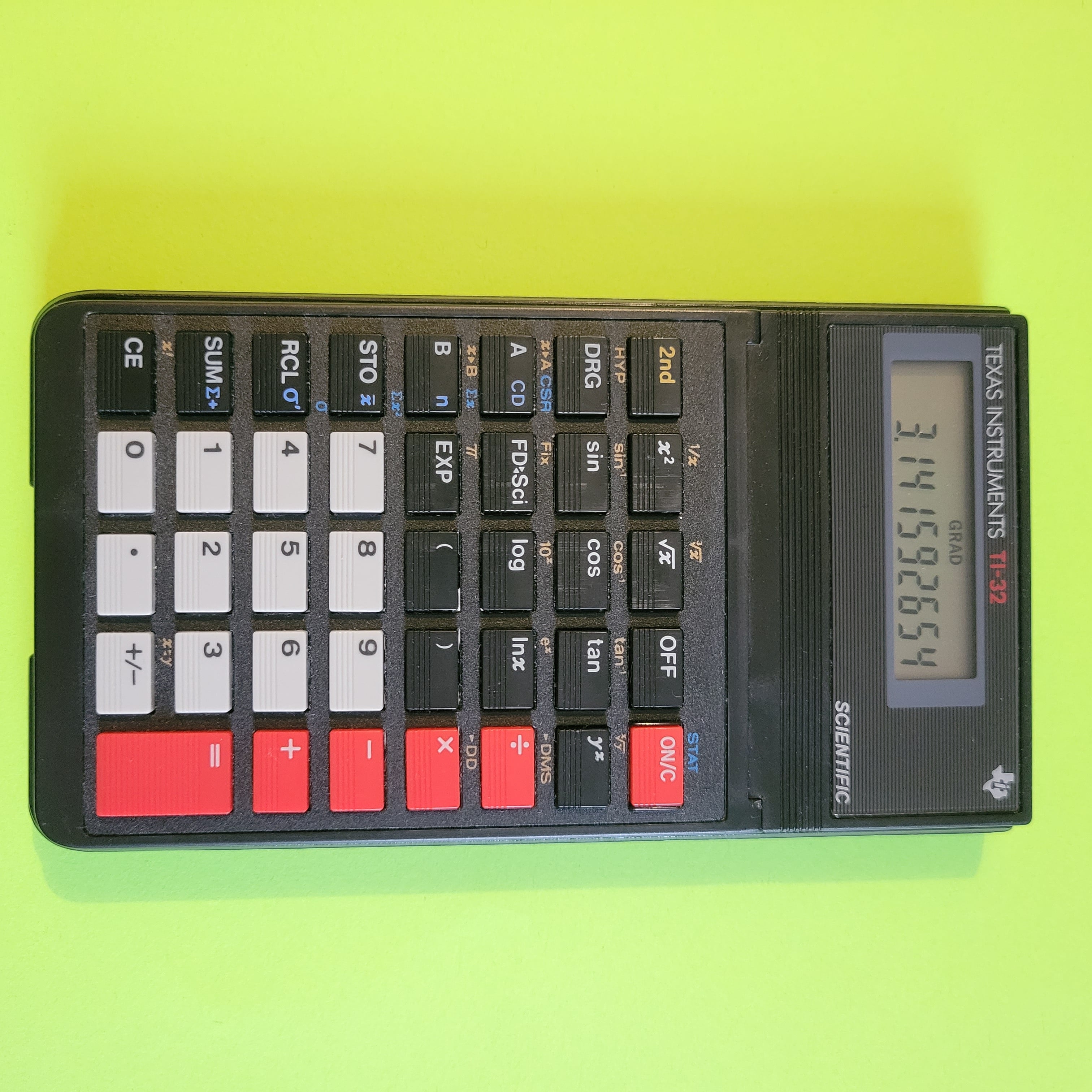 an image of a texas instruments ti-32 scientific/engineering calculator